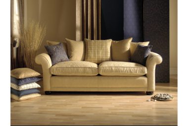 An inviting cream sofa with plush cushions
